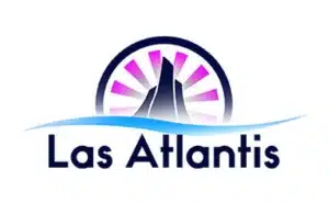 The logo of Las Atlantis Casino features an abstract representation of the mythical city of Atlantis. The design includes a stylized structure resembling a tower or a pyramid with radiating lines above it, suggesting a sunrise or an aura. The base of the structure is accompanied by wave-like elements, emphasizing an aquatic or oceanic theme. The text “Las Atlantis” is prominently displayed below the graphic in a clean, modern font. The overall color scheme includes shades of blue and pink, giving it a vibrant and mystical appearance.